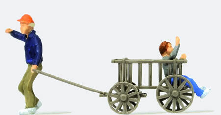 Preiser 28112 HO Scale Man Pulling a Child in a Wooden Cart