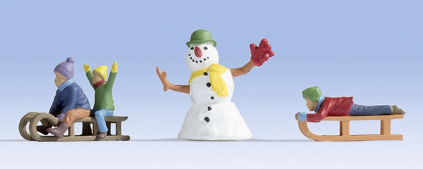 Noch 17921 O Scale Children Playing in the Snow -- 3 Children, 2 Sleds, Snowman
