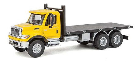 Walthers Scenemaster 11653 HO Scale International(R) 7600 3-Axle Flatbed Truck - Assembled -- Yellow Cab, Black Flatbed