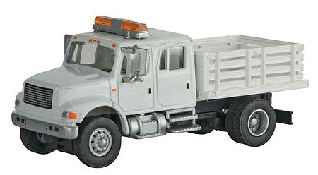 Walthers Scenemaster 11894 HO Scale International(R) 4900 Open Stake Bed Utility Truck - Assembled -- White w/Railroad Maintenance-of-Way Logo Decals