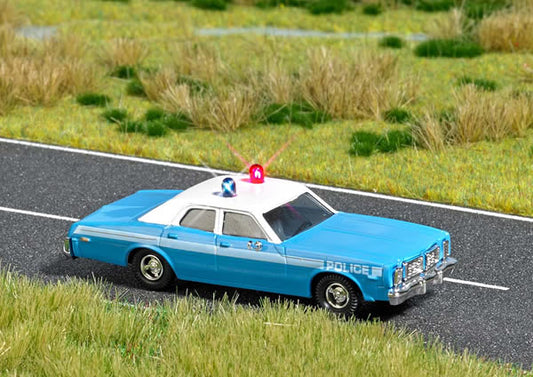 Busch 5629 HO Scale 1976 Dodge Monaco 4-Door Sedan with Working Lights - Assembled -- Police (Blue Body, White Canopy)