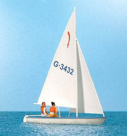Preiser 10676 HO Scale Korsar Sailboat w/Sailor -- Sails Up (white, red, blue)