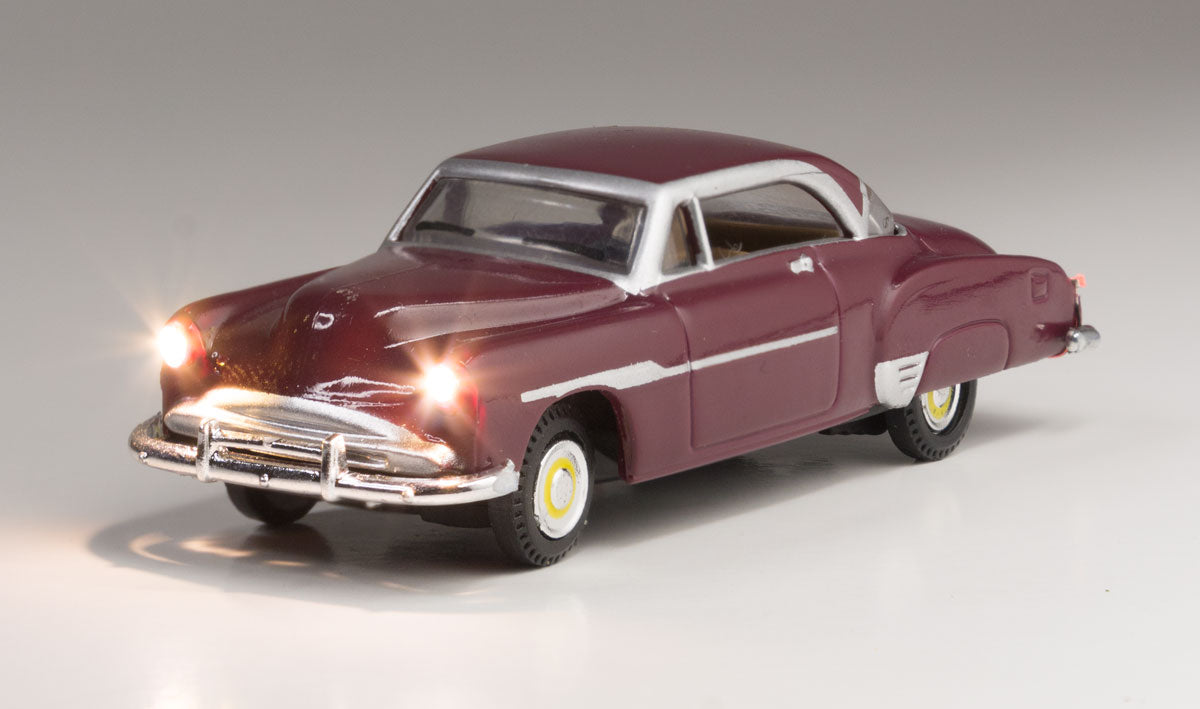 Woodland Scenics 5601 HO Scale Just Plug(R) Lighted Vehicle -- Downtown Drive - Sedan (maroon)