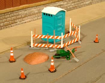 Bachmann 33114 HO Scale Building Site Details - SceneScapes(TM) -- Outhouse, Wheelbarrow, Barricade, Traffic Cones and Dirt Pile