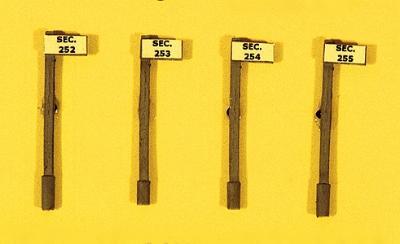 JL Innovative Design 835 HO Scale Custom Railroad Right-of-Way Signs -- Section Sign Set - Pole Style pkg(4)